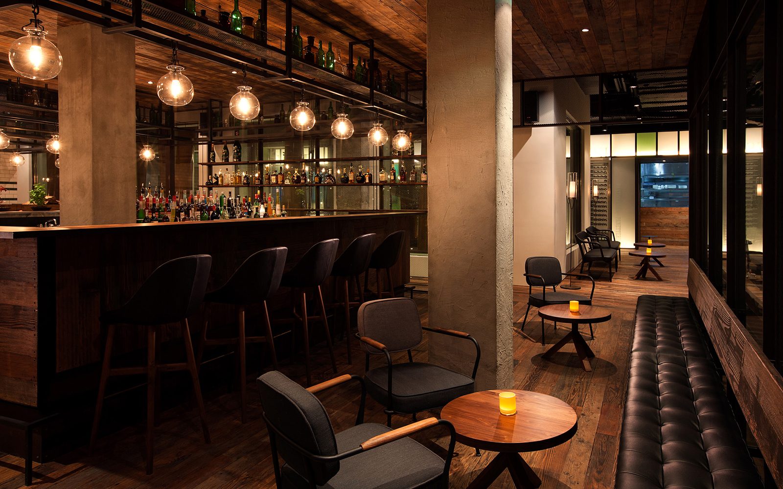 Mercato bar interior with warm lighting and reclaimed wood